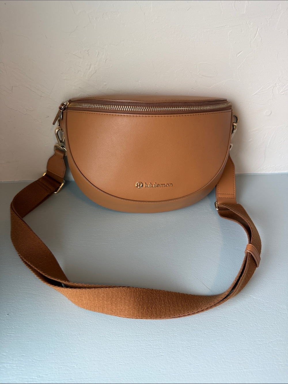 lululemon athletica Tan Half-Moon Crossbody Bag